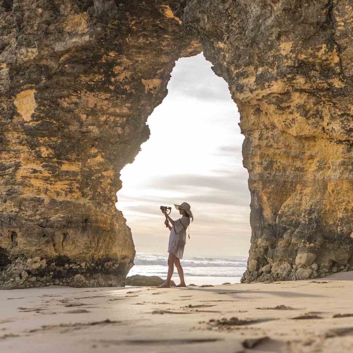 Rock arch framing the sea at Mbawana Beach
