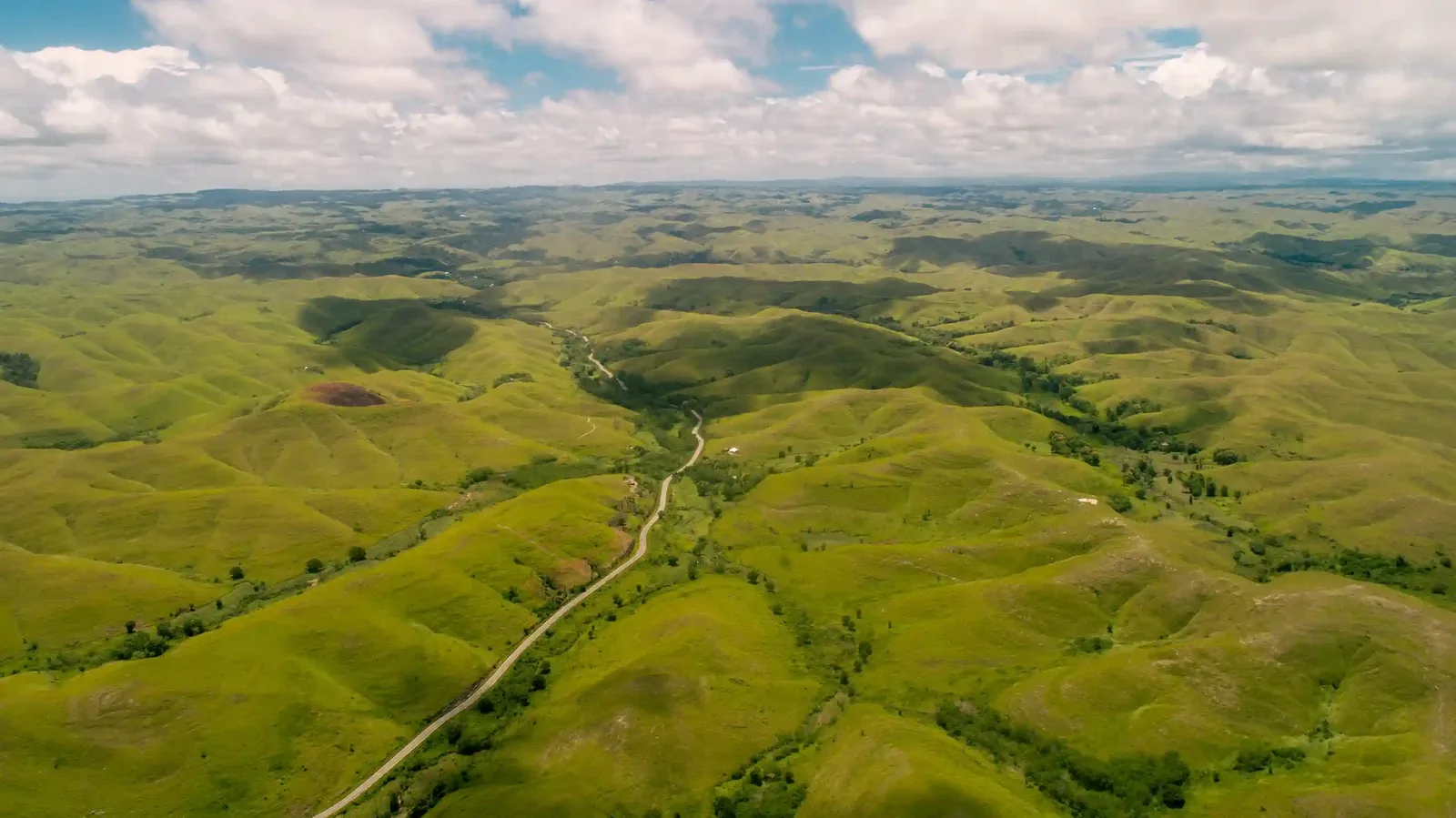 Rolling green hills at Tanau Hill