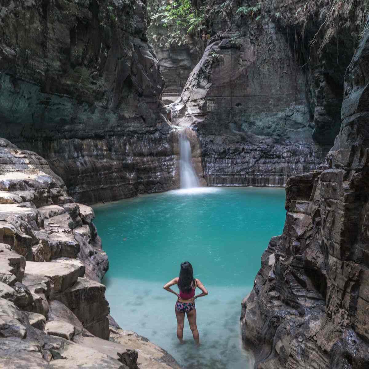 Waimarang Waterfall falling into a canyon pool