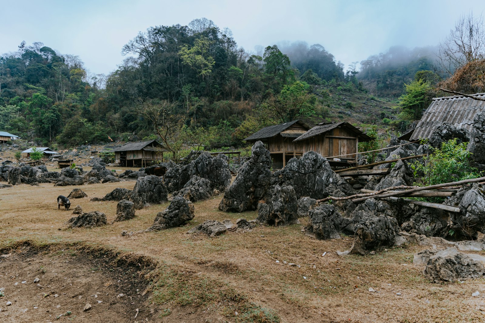 Small village nestled in a rocky landscape.